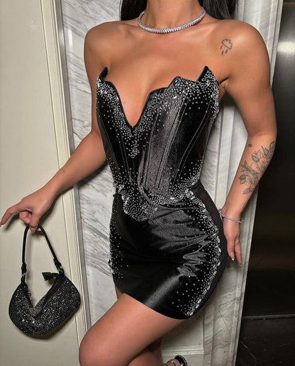 Ensemble jupe courte et bustier brillant de collection 2024