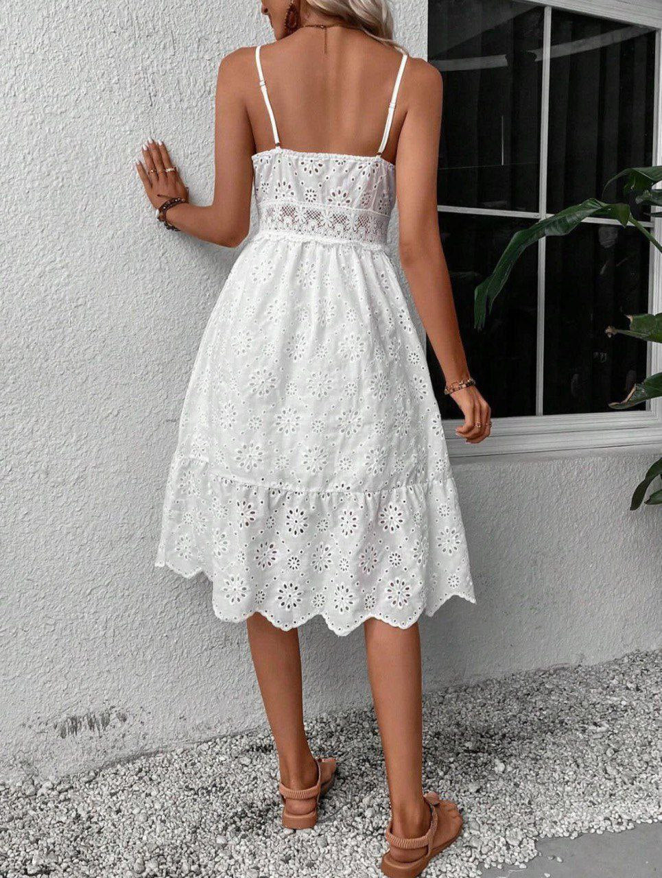 Robe blanche brodée mi long