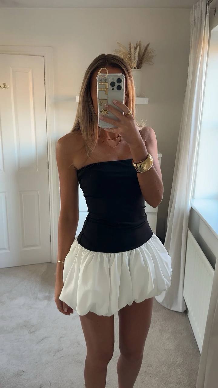 Soirée chic La Robe noire et blanc bustier asymétrique Osez l'originalité